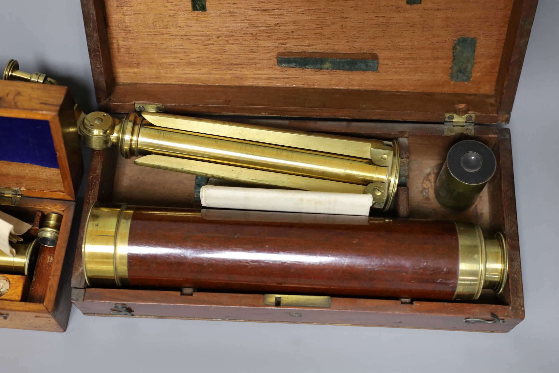 A Victorian Gilbert & Son portable achromatic telescope, boxed and a compound microscope